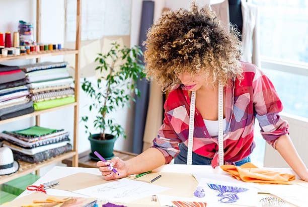 istock Young fashion designer working on new design. 477562326