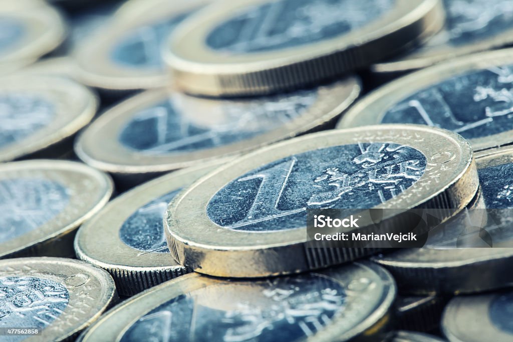 Euro coins. Euro money. Euro currency. Euro coins. Euro money. Euro currency.Coins stacked on each other in different positions. Money concept Home Finances Stock Photo