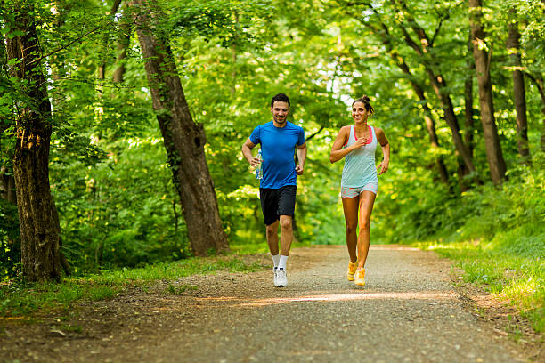 istock Young people running in nature 477562872