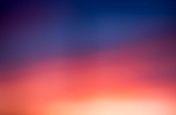 istock Blur background against orange and blue sunset sky. 477563102