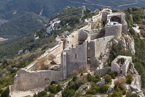Duilhac-sous-Peyrepertuse, France - April 3, 2015: Aerial view of the ruins of Chateau Peyrepertuse in Duilhac-sous-Peyrepertuse, France.