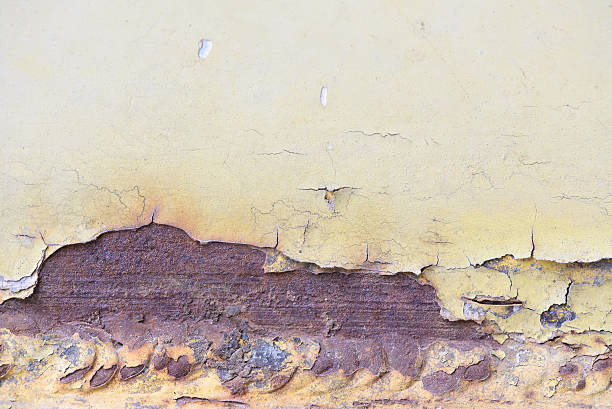 istock rusty on old metal and peeling off paint texture background 477563828
