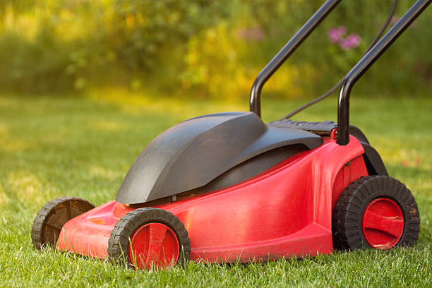 istock Lawnmower on lawn grass 477563928