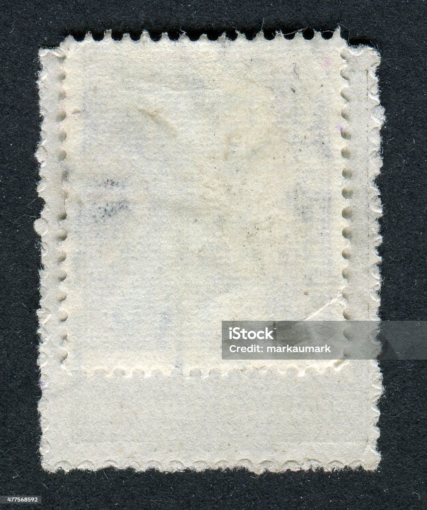 Reverse side of a postage stamp. The reverse side of a postage stamp. 2015 Stock Photo