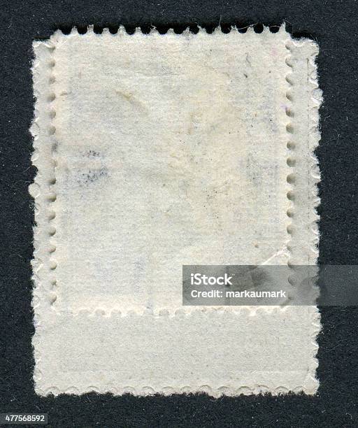 Reverse Side Of A Postage Stamp Stock Photo - Download Image Now - 2015, Backgrounds, Dirty