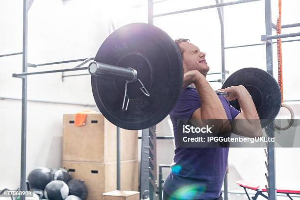 Working Out At The Gym Stock Photo - Download Image Now - 20-24 Years, 20-29 Years, 2015