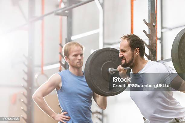 Working Out At The Gym Stock Photo - Download Image Now - 20-24 Years, 20-29 Years, 2015