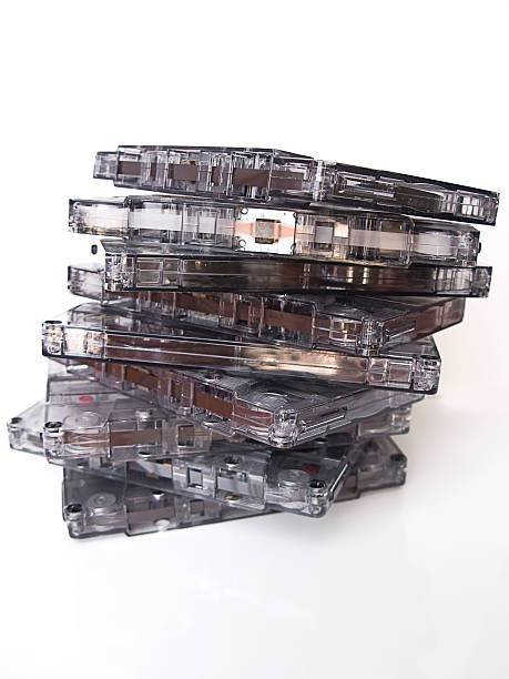 istock Pile of old fashioned cassette tapes, isolated in white 477570599