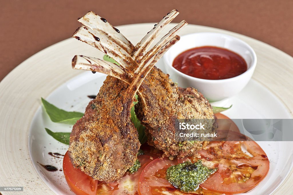 roasted lamb rib roasted lamb rib chops with vegetables Animal Bone Stock Photo