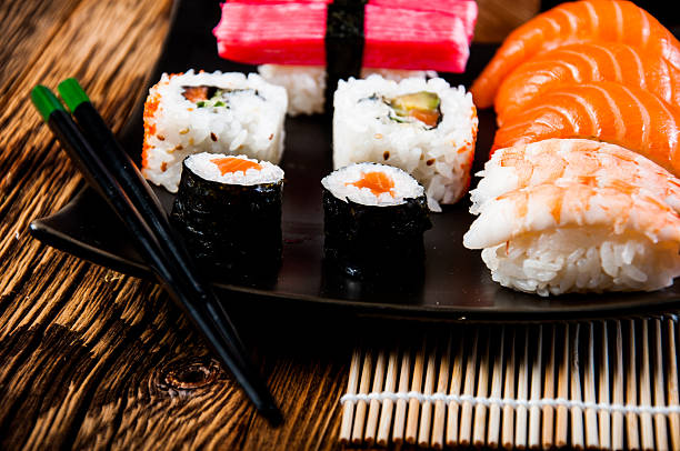 istock Japanese composition with sushi on the wooden table 477571229