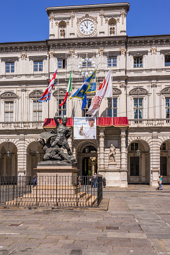 Turin, Italy - June 16, 2015: on the façade of the City Hall of Turin, a poster welcomes Pope Francis, who is going to visit the city. Turin. Italy.