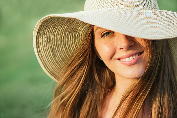istock Young beauty woman in summer hat 477573898