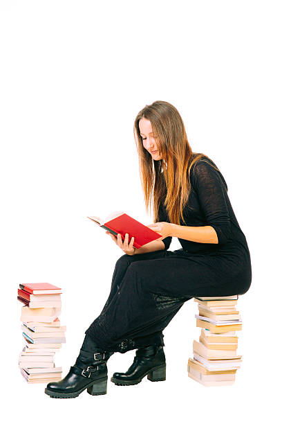 istock Girl with books 477576908