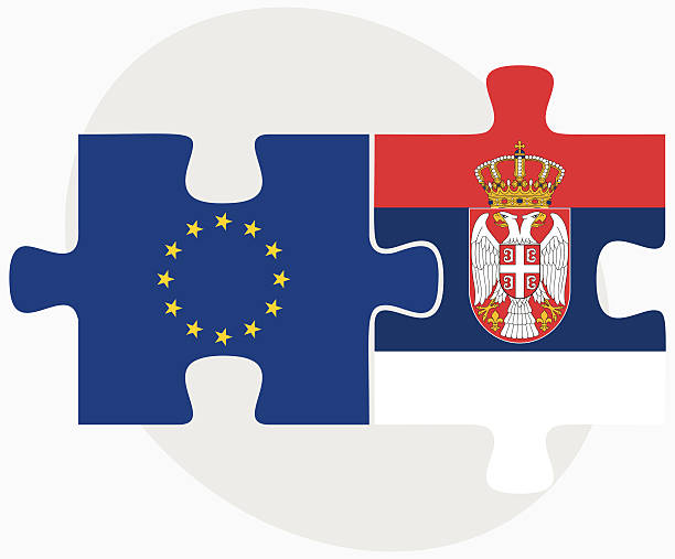 unii europejskiej i serbii flags w puzzle - belgrade serbia stock illustrations