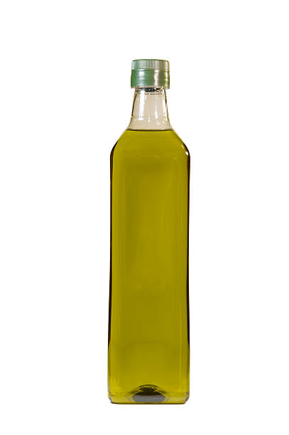 istock Olive oil bottle isolated over white background 477581014