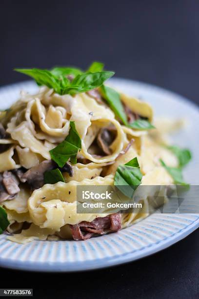 Pappardelle With Mushroom Bacon Parmesan And Basil Stock Photo - Download Image Now