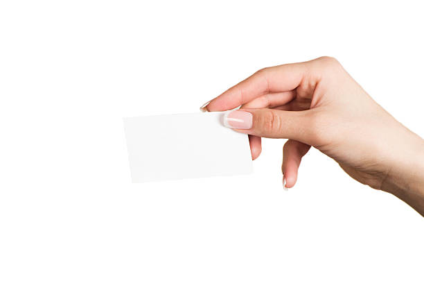istock Female hand holding a blank business card 477583744