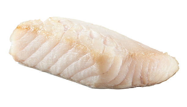 Prepared pangasius fish fillet pieces Prepared pangasius fish fillet pieces filleted stock pictures, royalty-free photos & images