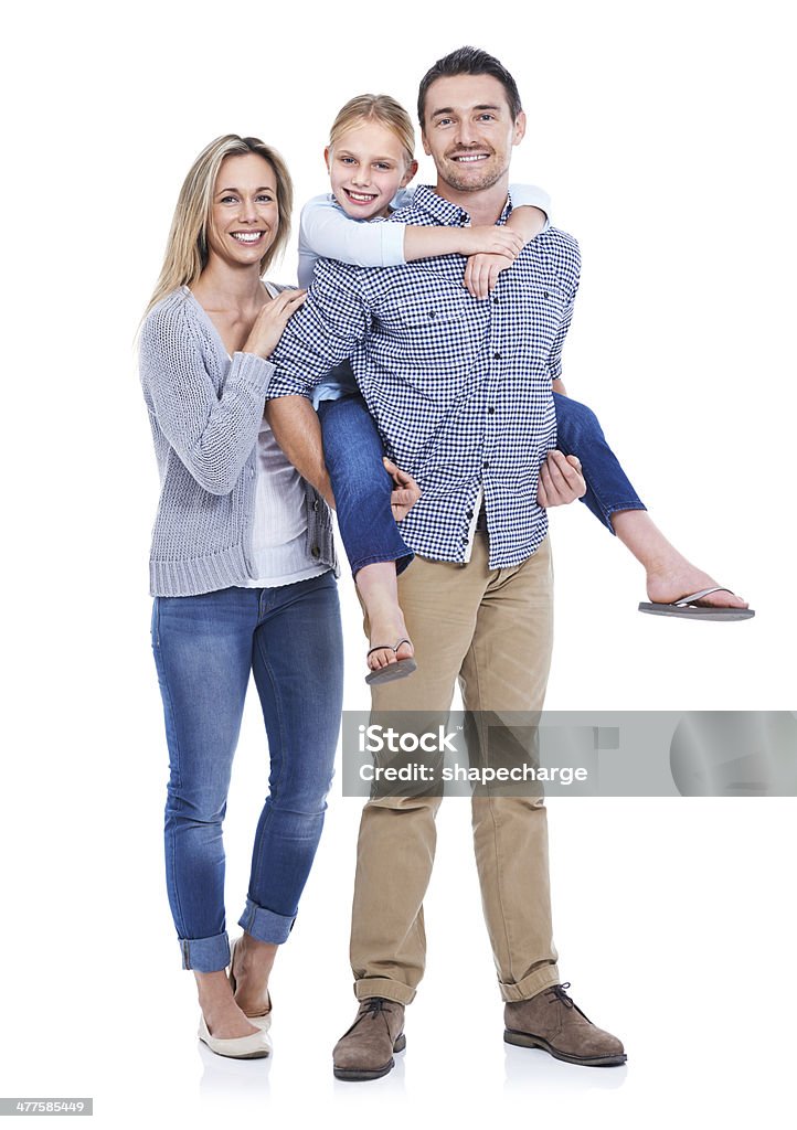 Family life agrees with them! Studio shot of a mother, daughter and father smiling at the camera against a white background Family Stock Photo