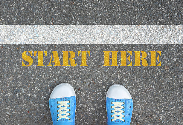 istock Shoes standing behind start line 477586354