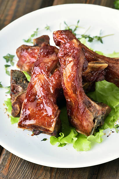 istock Grilled pork ribs on white plate 477587792