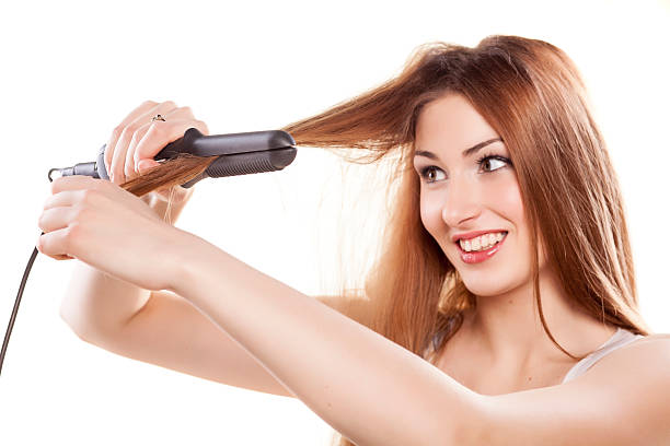 istock hair straightening 477591137