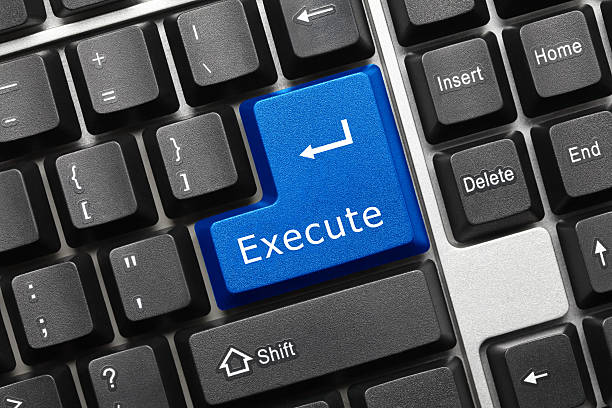 Conceptual keyboard - Execute (blue key) Close-up view on conceptual keyboard - Execute (blue key) executioner stock pictures, royalty-free photos & images