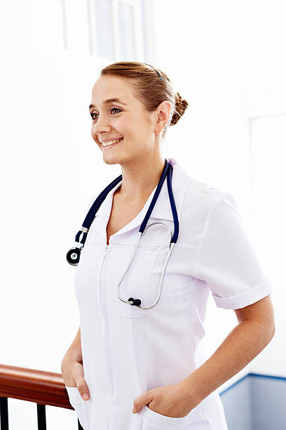 istock Young nurse smiles beautifully; a real Florence Nightingale! 477593647