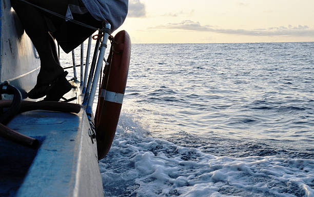 istock Sitting on the Boat's railings 477594636