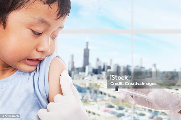 Boy Patient Scared Of Vaccine Syringe Stock Photo - Download Image Now - Anxiety, Child, Doctor