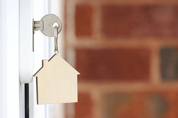istock Key in the Door with copyspace 477595275