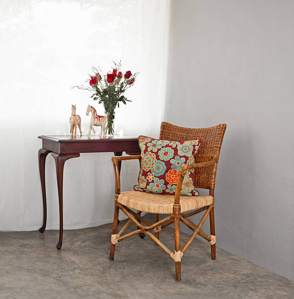 istock Rattan chair in a patio setting 477597717