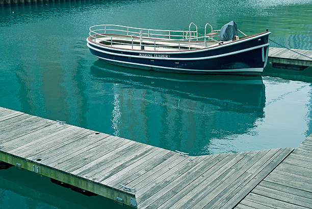 istock Tender boat moored to dock on Chicago River in Illinois 477598694