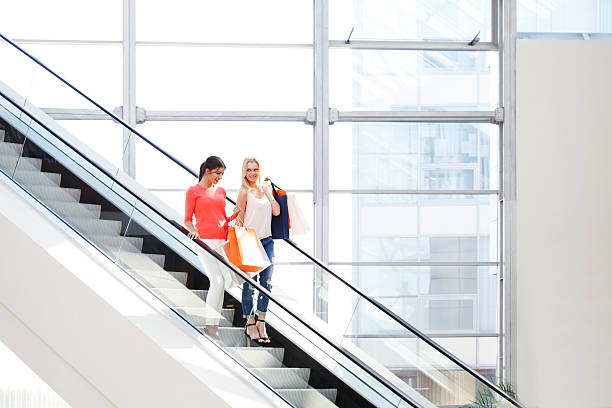 istock Women in shopping mall 477598818