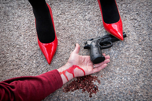 istock Man is dominated by a woman with red shoes 477599285