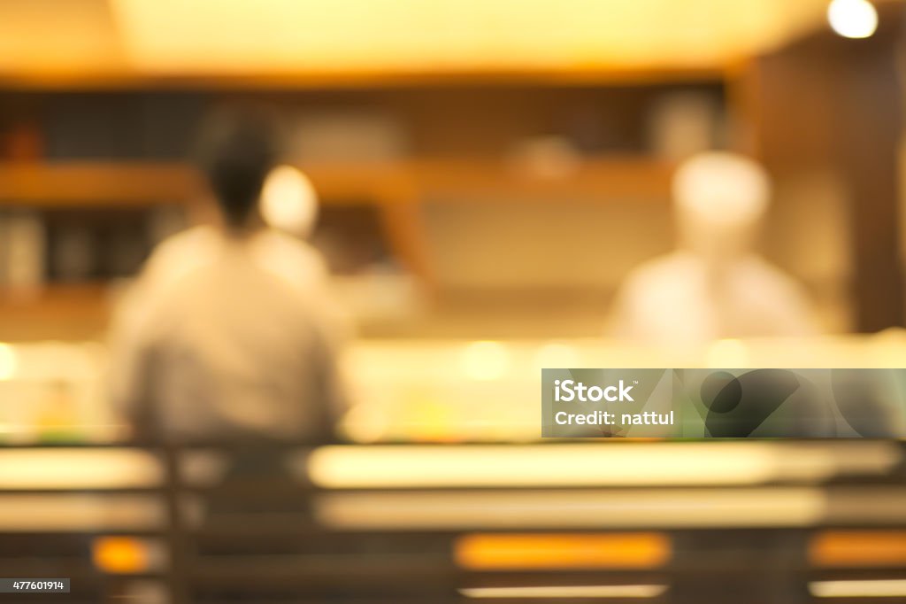 Blurry restaurant Abstract blurry sushi counter in vintage style decoration restaurant Elegance Stock Photo