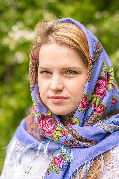 istock Beautiful woman in a headscarf smiling 477602338