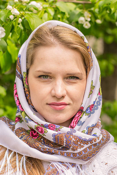 istock Beautiful woman in a headscarf smiling 477602468