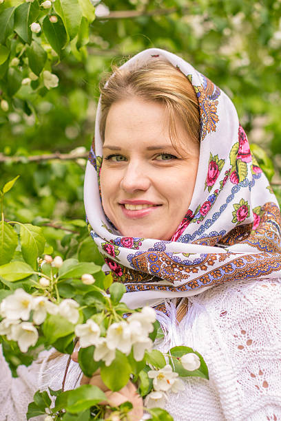 istock Beautiful woman in a headscarf smiling 477602730