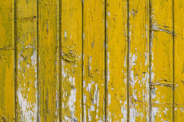 istock Background with old wooden yellow painted planks 477602940