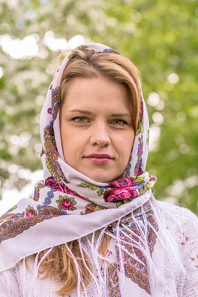 istock Beautiful woman in a headscarf smiling 477603442