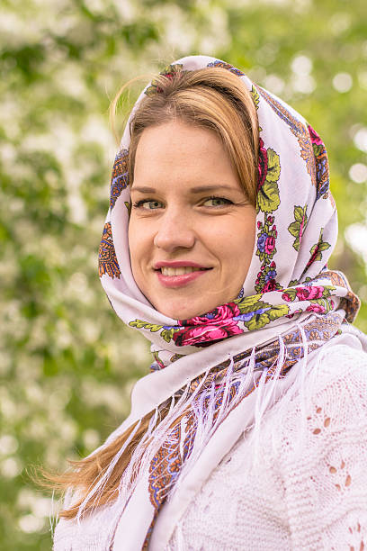 istock Beautiful woman in a headscarf smiling 477603484
