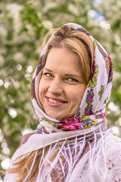 istock Beautiful woman in a headscarf smiling 477603530