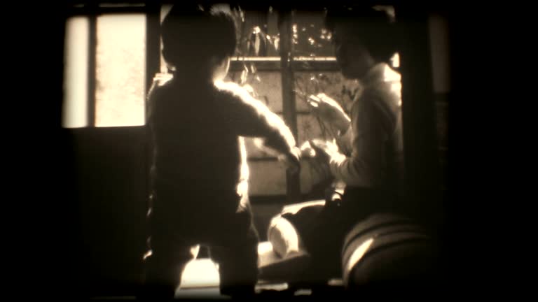 60's 8mm footage - Boy playing with a mother