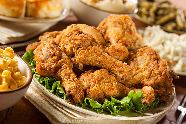 istock Close-up of southern fried chicken with biscuits 477606321