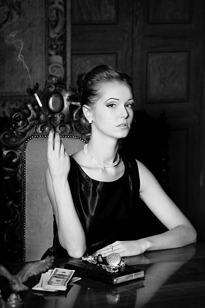 istock Woman smoke, retro style 477606361