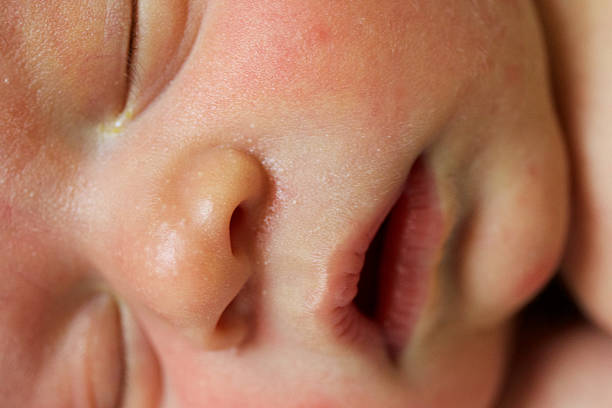 istock Closeup of newborn face 477606520