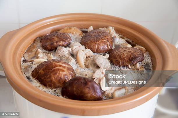 Stewed Shiitake Mushrooms With Pork In Slow Cooker Pot Stock Photo - Download Image Now