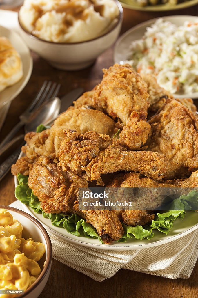 Homemade Southern Fried Chicken Homemade Southern Fried Chicken with Biscuits and Mashed Potatoes Animal Body Part Stock Photo