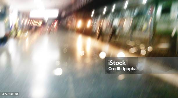 Blurred Train And People Movement In Railway Station At Night Stock Photo - Download Image Now